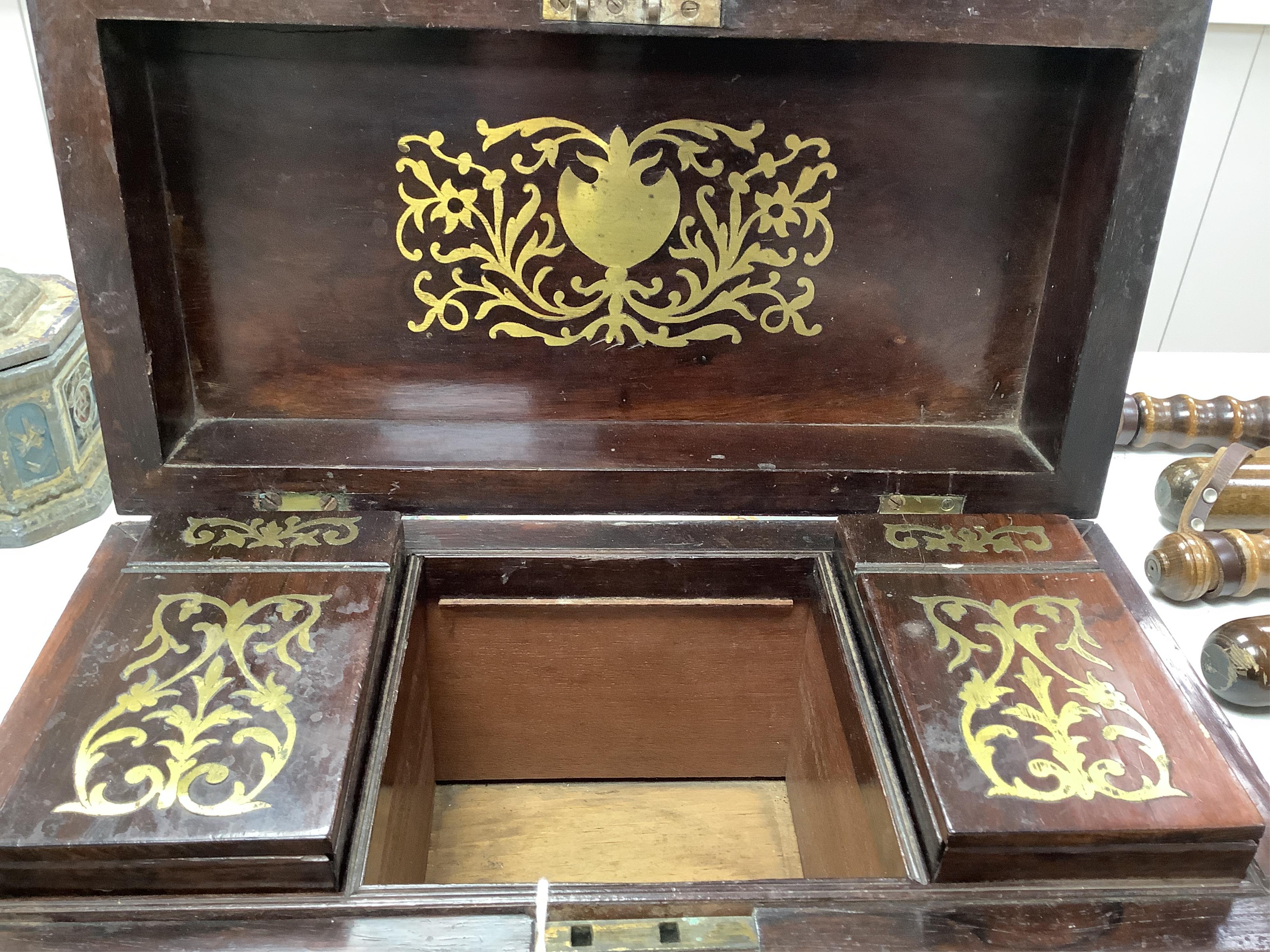 A William IV rosewood and cut brass inlaid tea caddy, 32cm wide